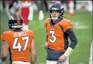  ?? HELEN H. RICHARDSON / THE DENVER POST ?? Broncos quarterbac­k Drew Lock comes off the field as time winds down in the fourth quarter against the Chiefs last Sunday at Empower Field at Mile High in Denver.