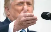  ?? ALEX BRANDON/AP ?? LEFT: Two bandages are visible on Trump’s hand.