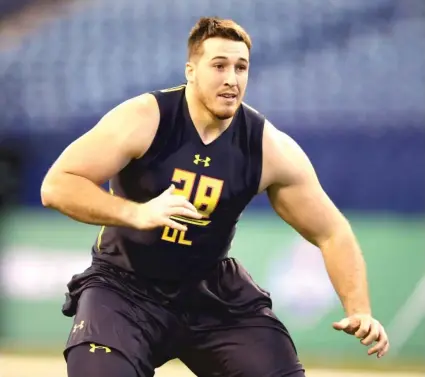  ??  ?? At 6- 6 and 312 pounds with long arms, Illinois State offensive lineman Cameron Lee has pro- level size. | MICHAEL CONROY/ AP