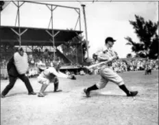  ?? THE ASSOCIATED PRESS ?? In this file photo, Lou Gehrig connects for a hit during a 1937 exhibition game against the Boston Bees in St. Petersburg, Fla.