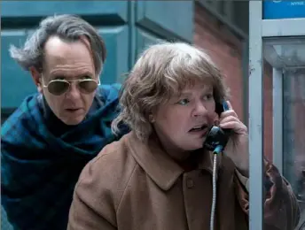  ?? Mary Cybulski ?? Richard E. Grant and Melissa McCarthy in “Can You Ever Forgive Me?”