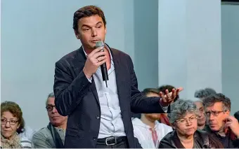  ??  ?? L’economista francese Thomas Piketty (1971) durante un dibattito a Parigi nel 2016 (Citizensid­e / Christophe Bonnet)