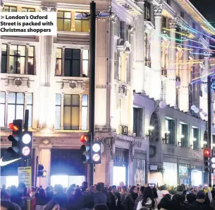  ??  ?? London’s Oxford Street is packed with Christmas shoppers