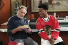  ?? MICHAEL YARISH — CBS VIA AP ?? This image released by CBS shows Judd Hirsch, left, and Jermaine Fowler in a scene from the new comedy series, “Superior Donuts,” beginning its second season on Monday.