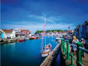  ?? (Shuttersto­ck) ?? Get your seaside stap l e of fish and chips at Weymouth Harbour
