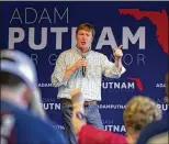  ?? ALLEN EYESTONE / THE PALM BEACH POST ?? Republican gubernator­ial candidate Adam Putnam addresses a rally Wednesday at the Yesteryear Village at the South Florida Fairground­s.