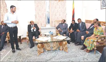  ??  ?? Mining Engineerin­g master’s degree student Matthew Marima (standing) delivers his vote of thanks to President Mugabe and his delegation following dinner at the Tehran home of Ambassador Nicholas Kitikiti