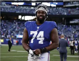  ?? ADAM HUNGER — THE ASSOCIATED PRESS ?? Giants offensive tackle Matt Peart walks off the field after defeating the Colts on Jan. 1, 2023, in East Rutherford, N.J.