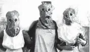  ??  ?? UNDER COVER: British Red Cross nurses in gas masks near the front in Flanders in April 1916