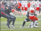  ?? Heidi Fang Las Vegas Review-journal @Heidifang ?? D.C.’S Jaquez Ezzard is tackled Feb. 25 at Cashman Field during an 18-6 loss for the Vipers in which they faltered again in the second half.