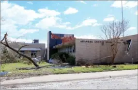  ?? THE ASSOCIATED PRESS ?? This August photo shows the Aransas County Courthouse in Rockport, Texas, which was among the buildings that received significan­t damage from Hurricane Harvey.