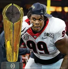  ?? CURTIS COMPTON/CURTIS.COMPTON@AJC.COM ?? After winning the national title in Indianapol­is in January, UGA defensive tackle Jordan Davis and 13 of his teammates will return to the city next month looking to boost their draft stock at the NFL scouting combine.