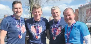  ?? ?? Mike Feeney, Martin Feeney, Dave Harte and Clem Leonard who competed in the Manchester Marathon.