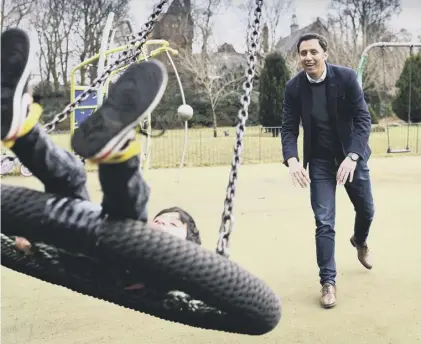  ??  ?? 0 Anas Sarwar plays with his son Ailyan in Glasgow’s Maxwell Park after his leadership victory