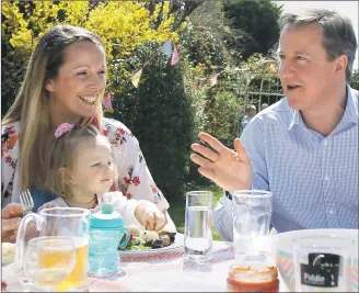  ??  ?? David Cameron with Lilli Docherty and daughter Dakota at a Money Back Monday event