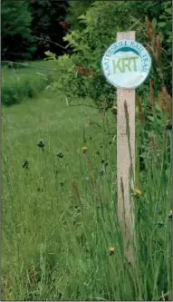  ??  ?? A Kaaterskil­l Rail Trail marker