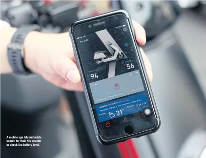  ??  ?? A mobile app lets motorists search for their Niu scooter or check the battery level.