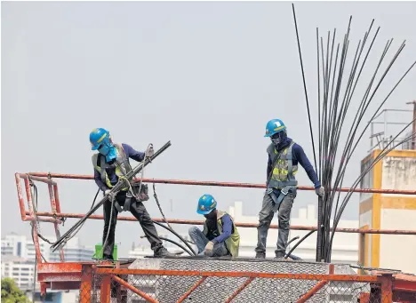  ?? PAWAT LAOPAISARN­TAKSIN ?? In June 2017, the government moved to crack down on illegal migrant workers, causing a labour exodus in which 250,000 non-registered workers returned home.