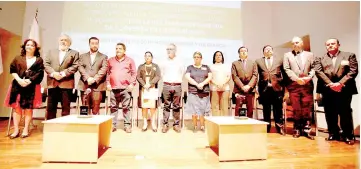  ??  ?? Families, human rights activists and Mexican government­al authoritie­s pose for a photo. — Reuters photo