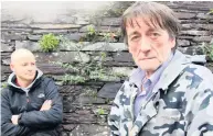  ??  ?? Philip Jones and friend Martin Walker who tried to save Buster the dog. Mr Jones’ fire-hit home, left, and inside a gutted room, left