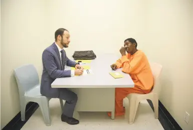  ?? Photos by Liz Hafalia / The Chronicle ?? Deputy Public Defender Chesa Boudin (left) interviews inmate D.J. during the Pretrial Release Unit’s work.