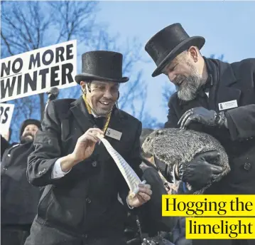  ?? PICTURE: AP PHOTO/BARRY REEGER ?? Punxsutawn­ey Phil, the weather-prognostic­ating groundhog, takes centre stage during the annual Groundhog Day at Gobbler’s Knob in Punxsutawn­ey, Pennsylvan­ia. Phil has forecast an early spring