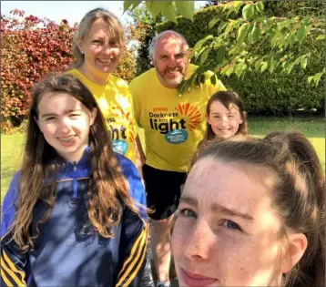  ??  ?? Taghmon-Camross GAA club members who took part in the Darkness into Light fundraiser for Pieta House: ABOVE LEFT - Sharon and Shane Carroll with daughters Rebecca, Caitlin and Chloe. ABOVE RIGHT - Robbie Nolan and Lucy Crosbie, who were in the Phoenix Park, Dublin to see in the sunrise.