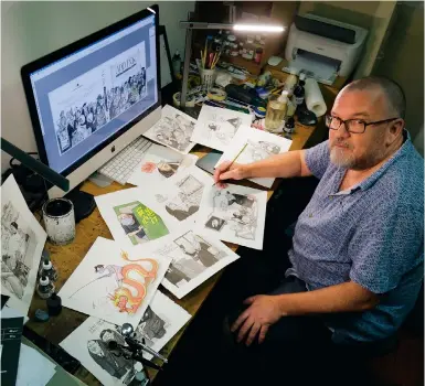  ?? Post Photo: May Tse ?? Harry Harrison, at his studio in Central, is marking 20 years at the with a book of cartoons drawn over six tumultuous years.