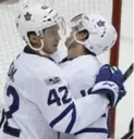  ?? GENE J. PUSKAR/THE ASSOCIATED PRESS ?? Slumping Tyler Bozak and Mitch Marner broke out with their first three-point nights of the season.