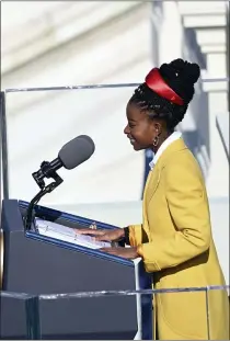  ?? SAUL LOEB — POOL PHOTO VIA AP ?? American poet Amanda Gorman reads a poem during the 59th Presidenti­al Inaugurati­on at the U.S. Capitol on Wednesday.