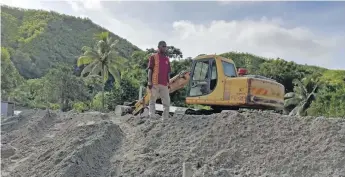  ??  ?? The Fiji Roads Authority team cleared the area in Draubuta in Navosa.