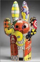  ?? (Courtesy of Arkansas Arts Center) ?? Aaron Calvert’s Rocket Rabbit is a stoneware, underglaze and gold ceramic enamel work. It is 19 by 12 by 9 inches in size.