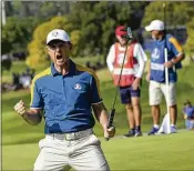  ?? ALESSANDRA TARANTINO/ASSOCIATED PRESS ?? Europe’s Justin Rose exults on the 15th green during his singles match at the Ryder Cup in Guidonia Montecelio, Italy. “This team felt on a bit of a mission,” Rose said.