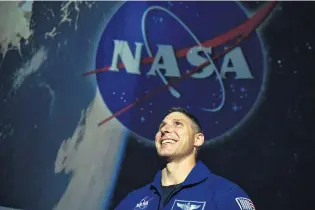  ?? PHOTO: PETER MCINTOSH ?? Inspiring the next generation . . . Nasa astronaut Colonel Michael Hopkins at the Otago Museum Planetariu­m yesterday, where he shared stories about life as an astronaut.