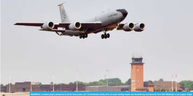  ??  ?? MILDENHALL: A handout picture released by the US Air Force shows a KC-135 Stratotank­er taking off for an aerial refueling mission over the North Sea from Royal Air Force (RAF) Mildenhall in east England. British police arrested a man at a US air base...