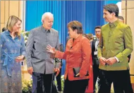  ?? AP ?? Flanked by Canada’s PM Justin Trudeau (right) and foreign minister Melanie Joly (left), US President Joe Biden speaks with Internatio­nal Monetary Fund managing director Kristalina Georgieva (second right) at the Asean gala dinner, in Phnom Penh, Cambodia, on Saturday.