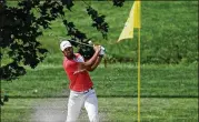  ?? DARRON CUMMINGS / ASSOCIATED PRESS ?? Second round co-leader Tony Finau hits from a bunker toward the fourth green during the second round of the Memorial on Friday.