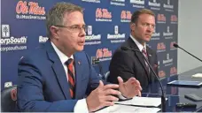  ?? BRUCE NEWMAN, AP ?? Mississipp­i Chancellor Jeffrey Vitter, left, and athletics director Ross Bjork spoke about Hugh Freeze’s exit Thursday.