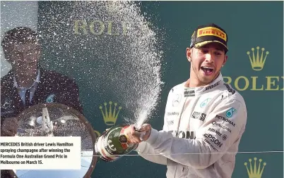  ??  ?? MERCEDES British driver Lewis Hamilton spraying champagne after winning the Formula One Australian Grand Prix in Melbourne on March 15.