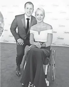  ?? ADAM BETTCHER, GETTY IMAGES, FOR STARKEY HEARING ?? Weggemann, pictured with her fiancé, was paralyzed as a teenager when a routine procedure ended up as a lifechangi­ng event.