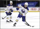  ?? ASSOCIATED PRESS PHOTO ?? Buffalo Sabres’ Casey Mittelstad­t (37) takes a shot in the third period of an NHL hockey game against the New York Rangers April 25 in New York.