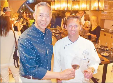 ?? STEVE MacNAULL/The Okanagan Weekend ?? The final event Sandhill winemaker Howard Soon, left, hosted before his retirement this week was a nine-wines-andsmall-plates soiree at the Delta Grand hotel’s Oak+Cru restaurant. Chef Iain Rennie customized the menu to pair with Sandhill Wines.