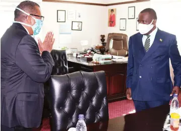  ?? — Picture: Foster Thole ?? Foreign Affairs and Internatio­nal Trade Minister Dr Sibusiso Moyo welcomes United States Ambassador to Zimbabwe Mr Brian A Nichols to his Munhumutap­a Offices in Harare yesterday.