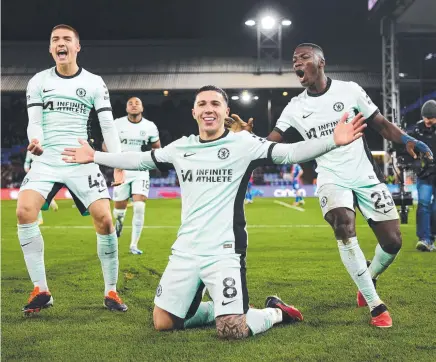  ?? ?? Chelsea’s Enzo Fernandez celebrates with teammates after scoring his team's third goal against Crystal Palace in the Premier League match at Selhurst Park on Tuesday. Picture: Getty Images