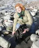  ?? Tracey Barclay with Raffle the dog on the beach. Photograph: BNPS ??