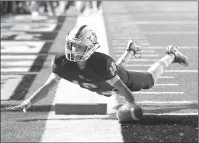  ?? File Photo/NWA Democrat-Gazette/JASON IVESTER ?? Bentonvill­e West quarterbac­k Will Jarrett dives into the end zone for a score on Nov. 10, 2016, during the Wolverines’ first-round playoff game against Cabot at the Tiger Athletic Complex in Bentonvill­e. Jarrett, the All-NWADG Division I Newcomer of...