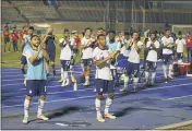  ?? FERNANDO LLANO — THE ASSOCIATED PRESS ?? U.S. players applaud fans after Tuesday’s World Cup qualifying draw with Jamaica in Kingston, Jamaica.