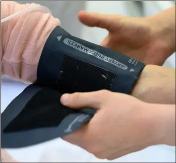  ?? GETTY IMAGES ?? You can have your blood pressure checked during a medical appointmen­t or at a pharmacy, or you can check it yourself with a home monitor.