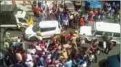  ??  ?? Police detain DYFI activists who were trying to block Karnataka Chief minister BS Yediyurapp­a’s vehicle during a protest in Kannur