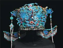  ?? PHOTOS PROVIDED TO CHINA DAILY ?? From left: Two items made by He Hongyan (bottom): a phoenix-shaped headdress, and a piece of headgear in the style of the Ming Dynasty (1368-1644), made with simple things like goose feathers and recycled beverage cans.